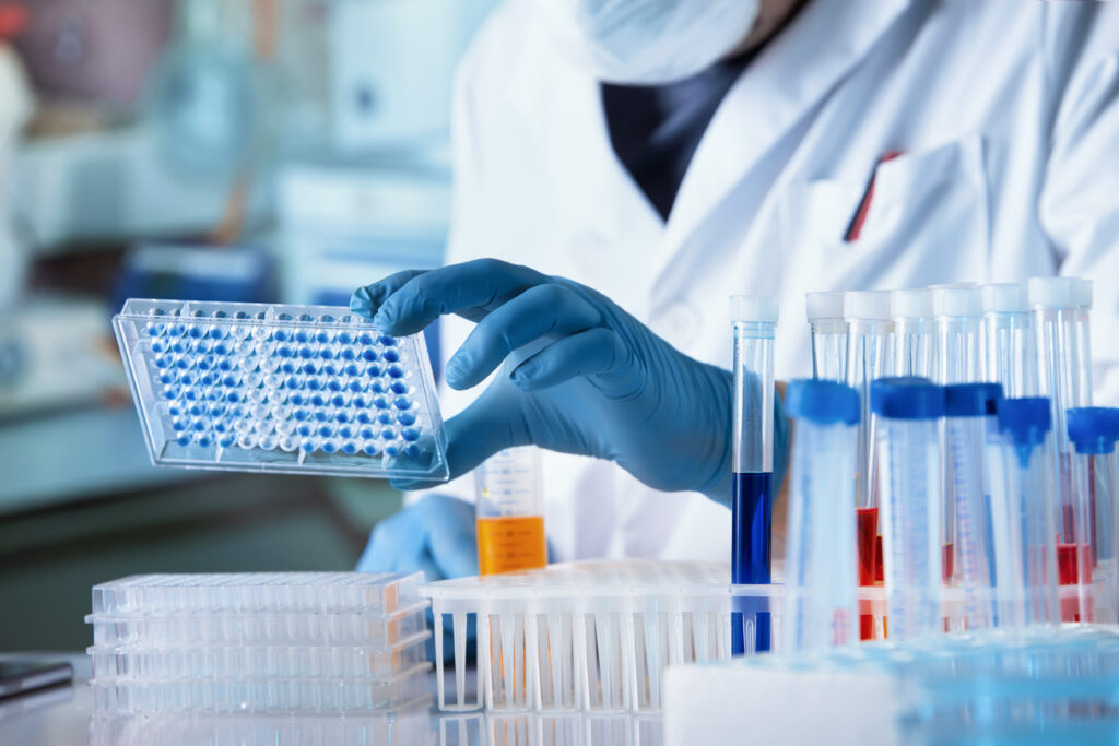 Doctor analyzing genetic samples. Healthcare fraud concept.