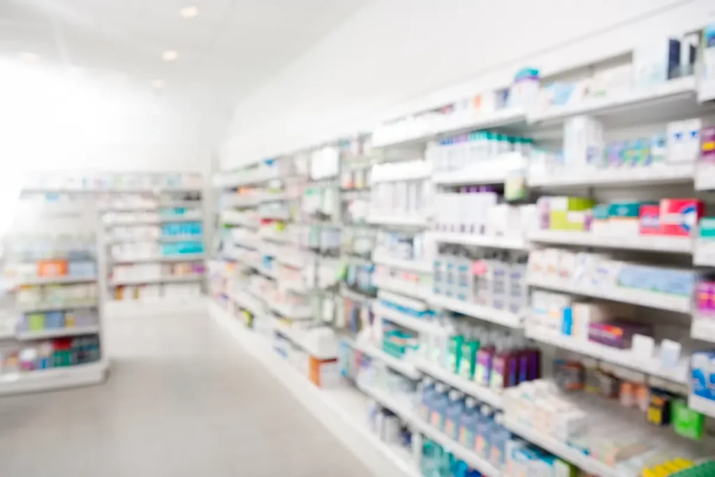 An image of an aisle inside a pharmacy. Healthcare fraud concept.